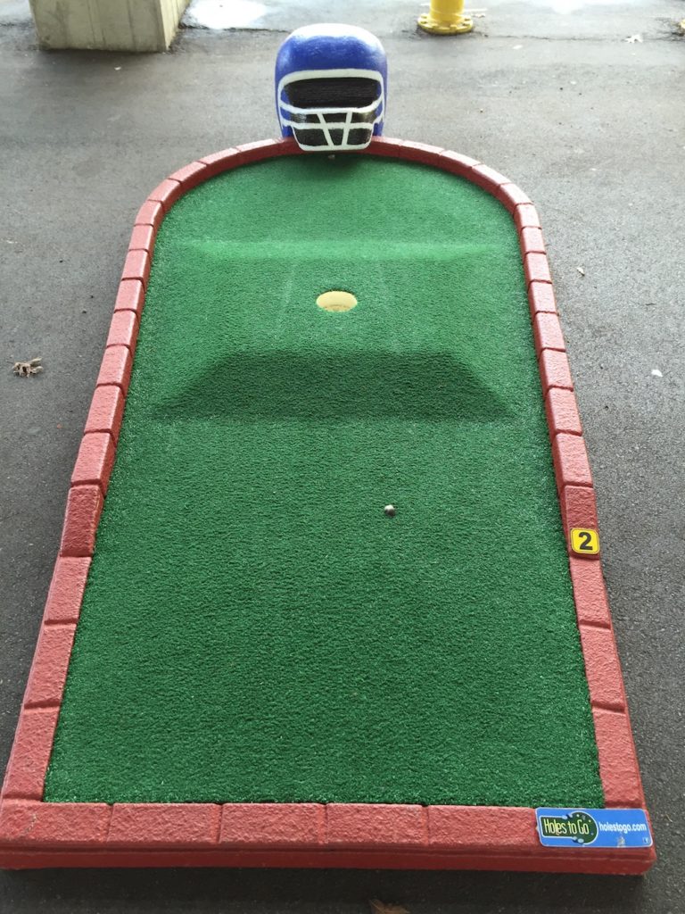 football themed portable mini golf course & tent